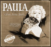 A second citrus box label titled Paula depicts a lady holding a fan. The two labels are often desplayed together.